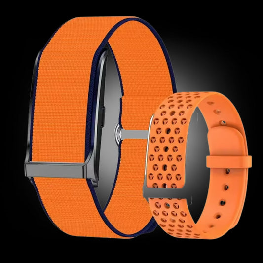 Two orange watch straps with different patterns on a black background